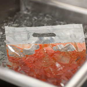 Bag placed in an ice bath for rapid cooling.