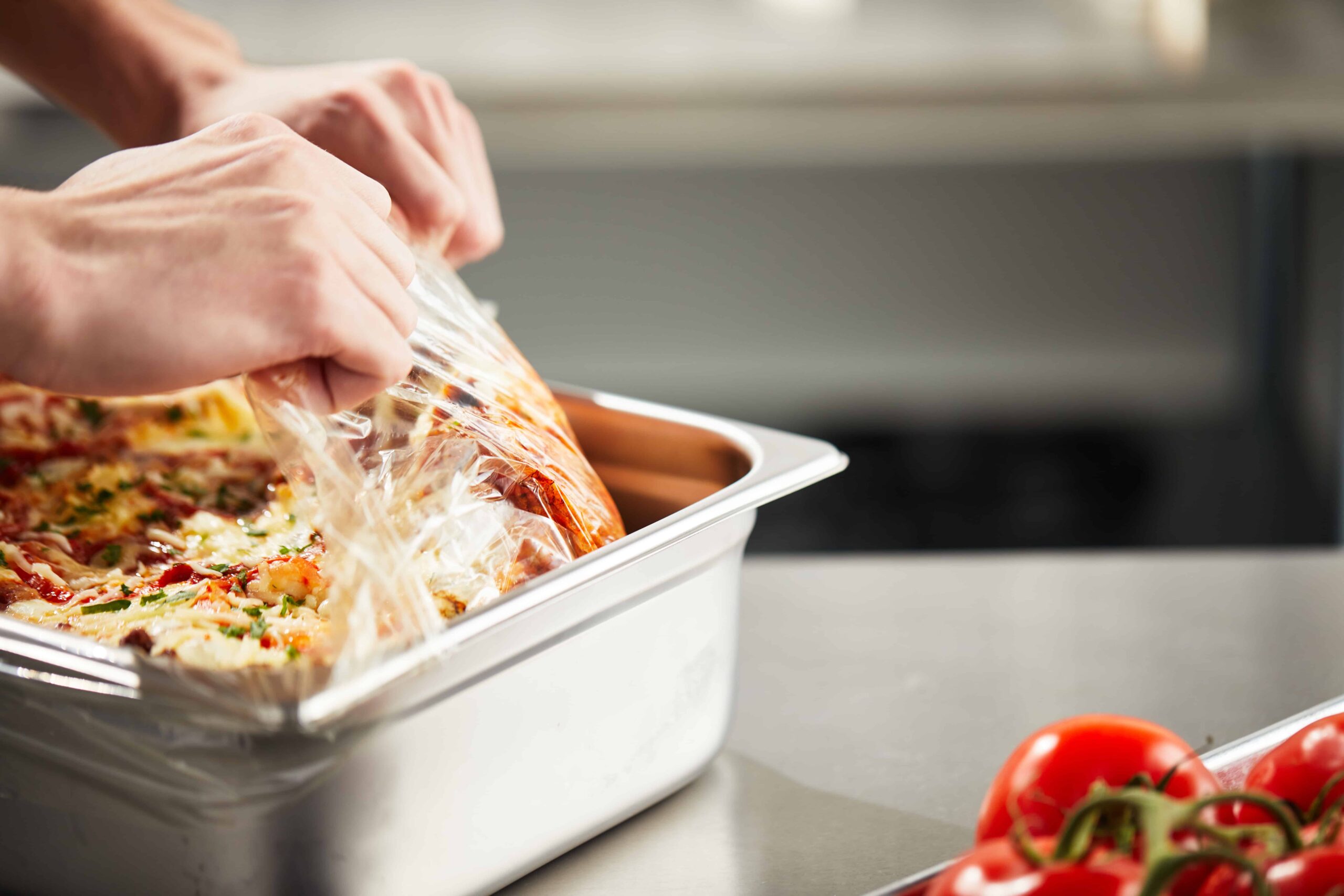 Disposable pan liner for lasagna.